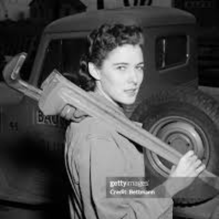 A historical black-and-white photograph of Lilian Ann Baumbach, the first woman in the United States to become a Master Plumber. She is seen confidently holding a large pipe wrench, symbolizing her expertise and leadership in the industry.