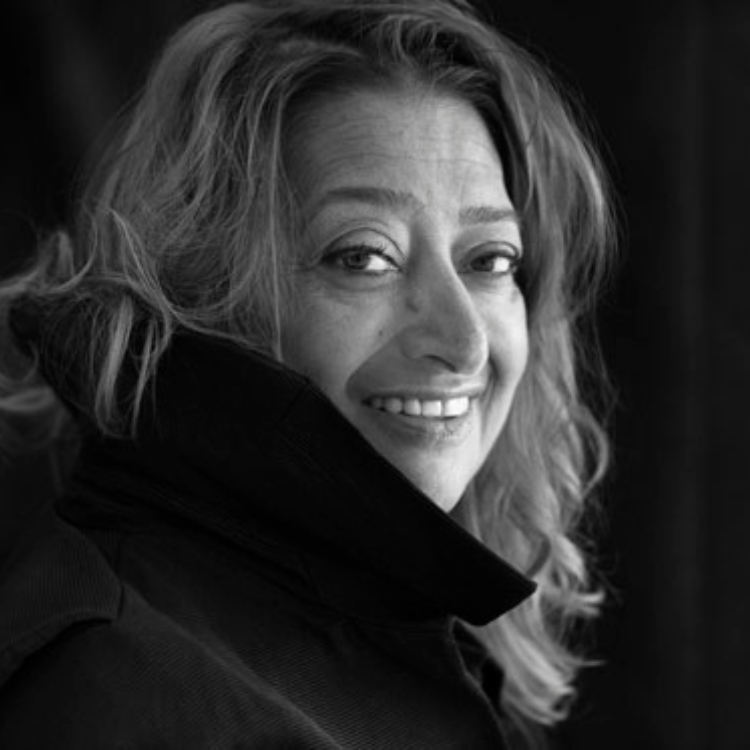 A portrait of Zaha Hadid, the pioneering architect known as the "Queen of the Curve." She revolutionized modern architecture with bold, fluid designs such as the Heydar Aliyev Center and the London Aquatics Centre. As the first woman to win the Pritzker Architecture Prize.