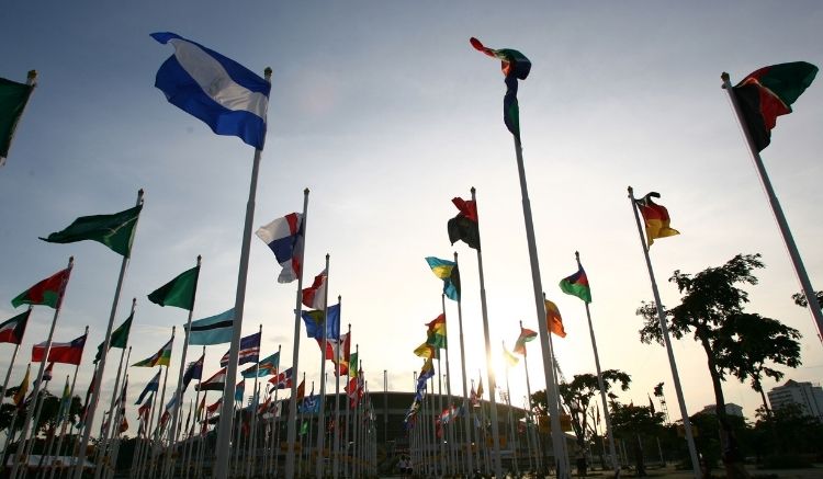 many flags flying close together