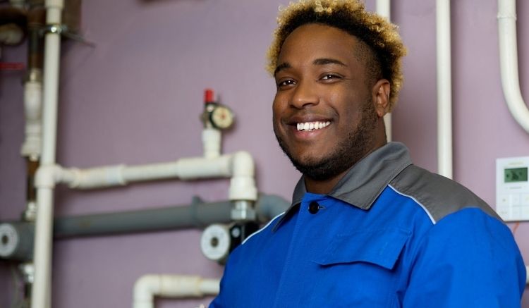 Smiling young man in a blue jacket