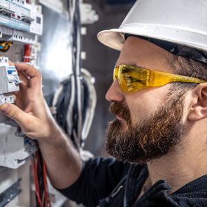 electrician in white hard hat up close
