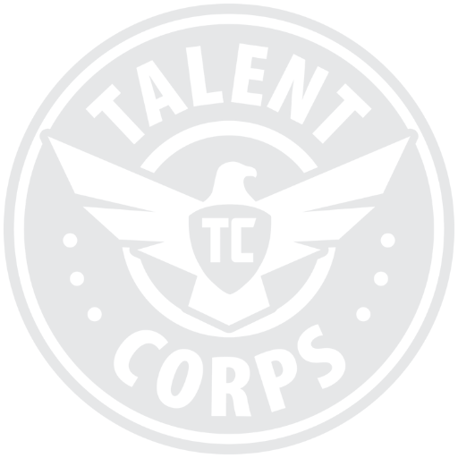 Grey and white circular Talent Corps logo.